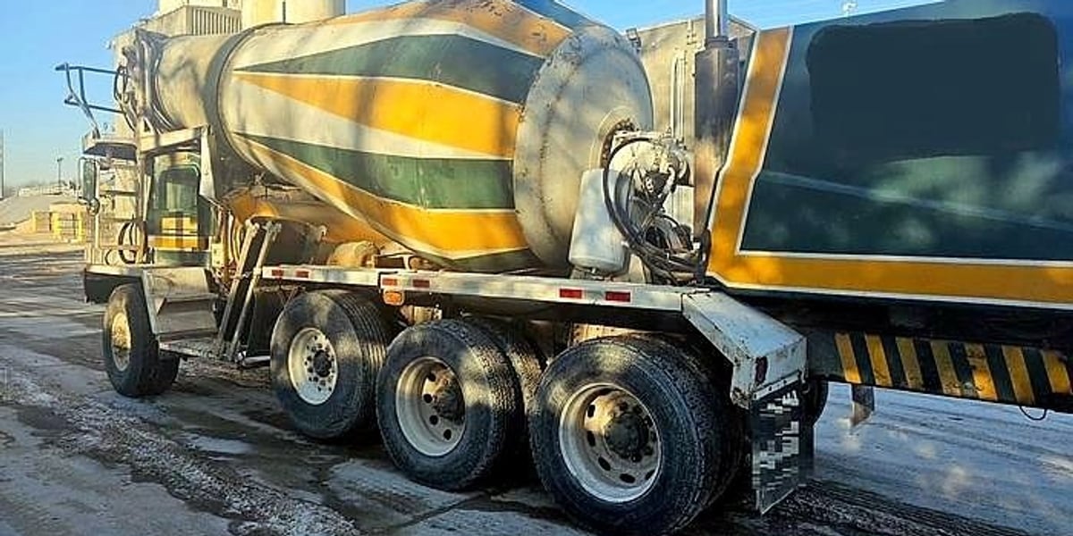 2000 Oshkosh S-Series Front Discharge Mixer, driver side fall (stock TM-183)